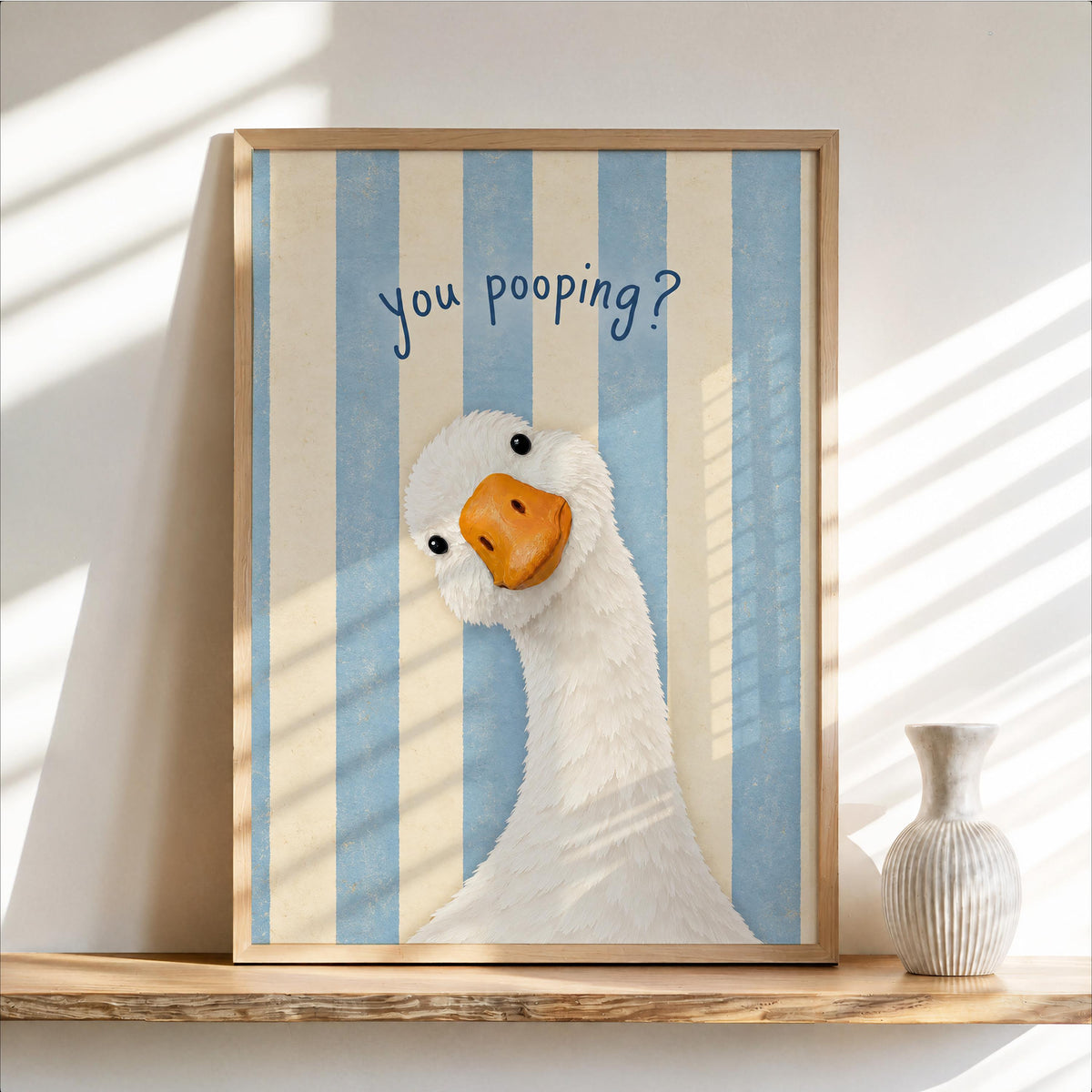 Framed blue striped funny goose bathroom print, curious white goose peeking with 'You pooping?' text