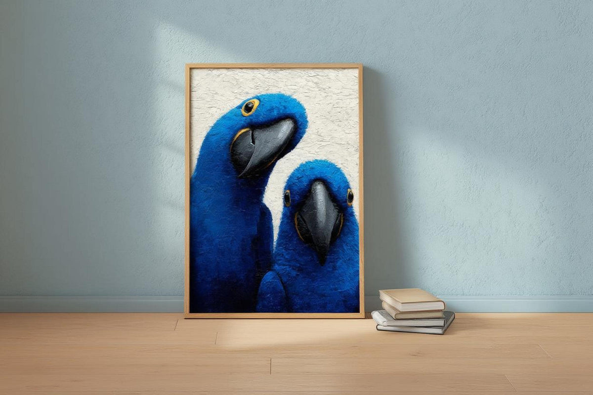 Blue macaw wall art leaning against a pale blue wall on a low table, shadowed corner with a stacked book