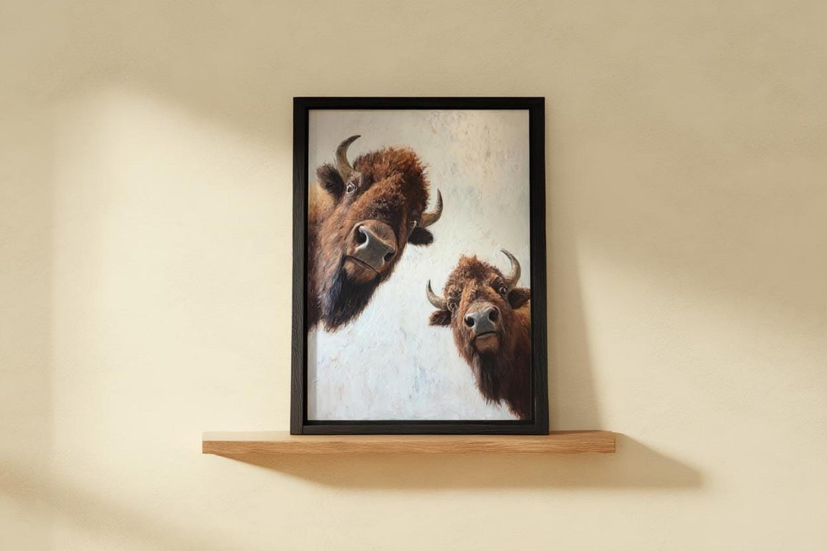Black framed bison wall art centered on floating shelf, calm neutral colors, rustic charm