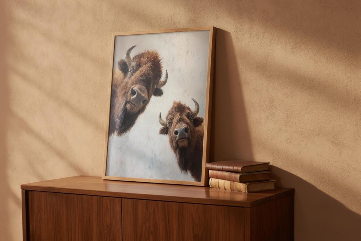 Soft light on bison wall art leaning against wood cabinet, buffalo wall decor mood